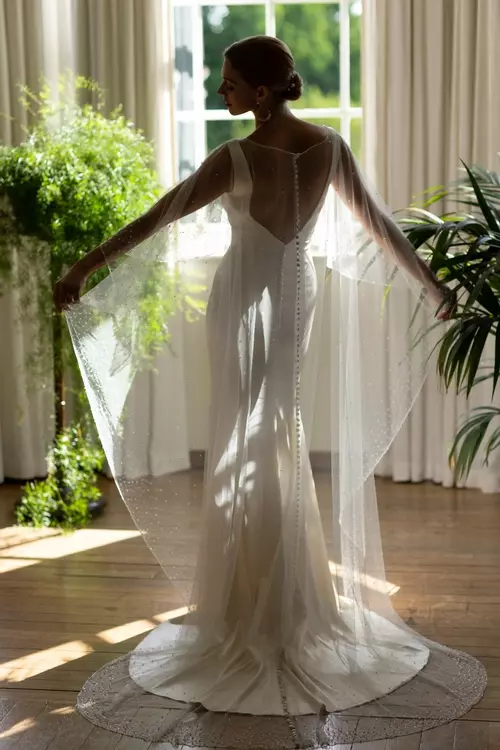 A dress with deals a cape